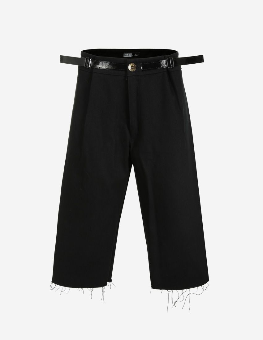 Trousers with overlay